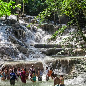 Ocho Rios, Jamaica - November 15, 2016: The Dunn's River Falls are waterfalls in Ocho Rios in Jamaica, which can be climbed by tourists.